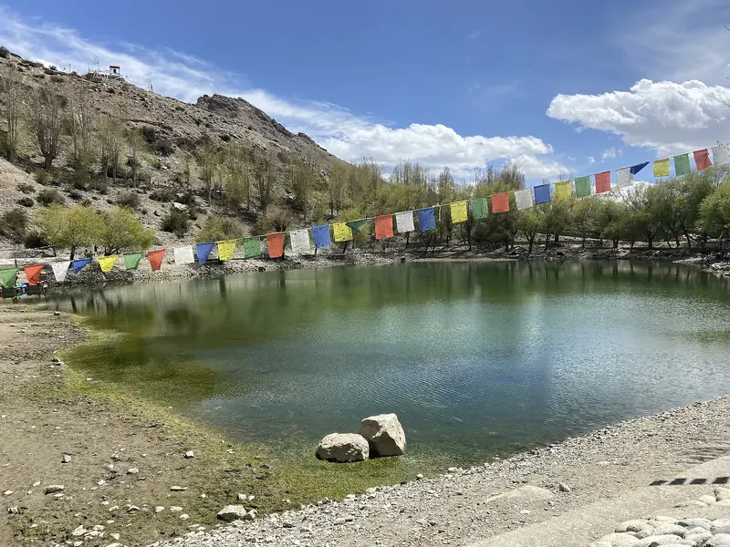 Nako lake with prayer flags in Kinnaur